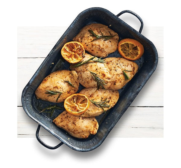 Poitrines de poulet désossées et sans peau préparées à partir de surgelés avec tranches de citron