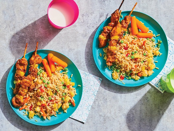 Poulet satay avec riz et mélange de légumes